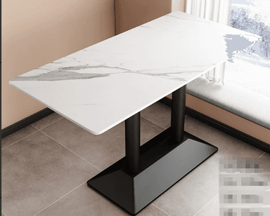 The image displays a contemporary rectangular table featuring a white top with grey faux marble veining and a contrasting black metal twin pedestal base. The tabletop has subtly rounded corners, presenting a sleek and modern aesthetic. The base consists of two robust cylindrical columns affixed to a rectangular, slightly trapezoidal plinth, providing stable support. The overall design emphasizes clean lines and a minimalist profile, suitable for various modern interiors. — 3D model