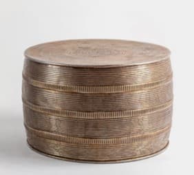 A cylindrical drum-shaped object, serving as a side table or stool, made from metal with a heavily textured surface featuring horizontal bands and concentric ring patterns on its top and sides, presenting an aged metallic finish. — 3D model