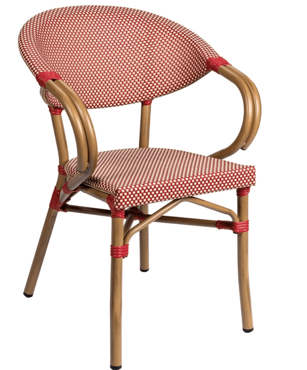 A woven armchair with a curved back and armrests, featuring a checkered pattern on the seat and back. The frame and legs are cylindrical and appear to be made of metal, possibly aluminum or steel, with a wood-grain finish. Red decorative bands are wrapped around the joints of the frame and the base of the armrests. The seat and back are upholstered or woven with a red and white checkered fabric or synthetic material. — 3D model