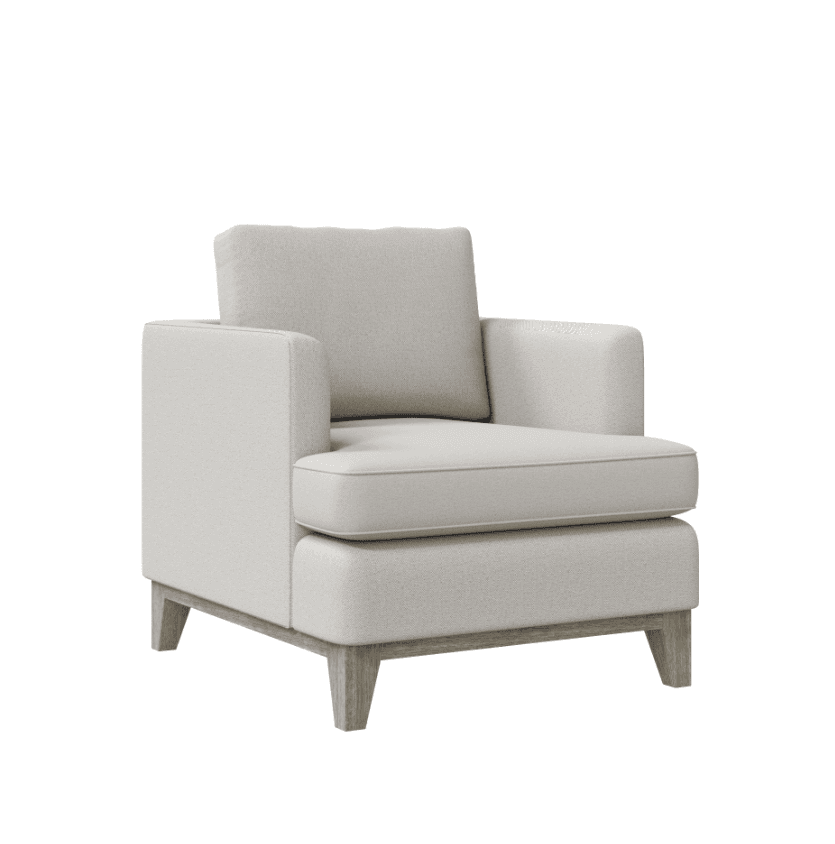 A contemporary armchair with a clean, boxy silhouette. It features plush, upholstered cushions for the seat and back, with a separate lumbar cushion. The frame is supported by four tapered wooden legs and a minimalist wooden base. The upholstery appears to be a textured fabric. — 3D model