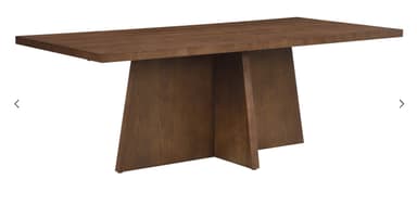 A modern, rectangular dining table crafted from dark brown wood, featuring a thick tabletop and a distinctive sculptural pedestal base formed by intersecting angled panels. — 3D model