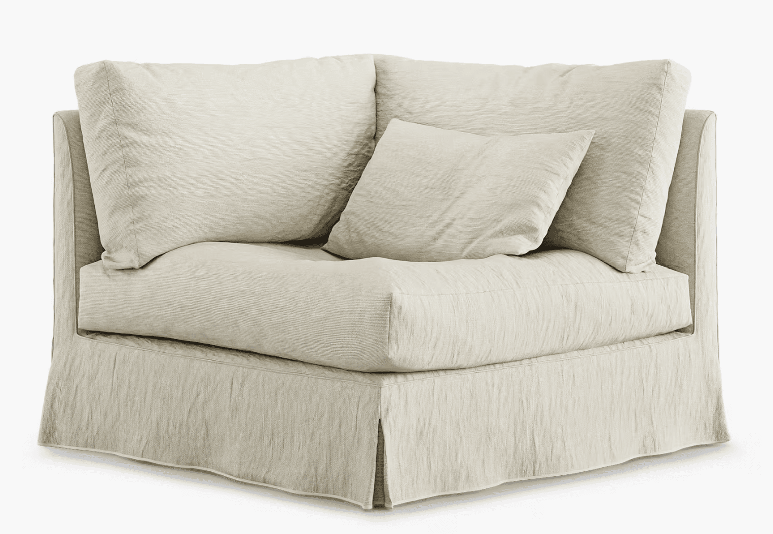 A corner armchair upholstered in a textured, light-colored fabric. It features a skirted base and includes multiple loose back cushions and one accent pillow. The design appears to be contemporary and relaxed. — 3D model