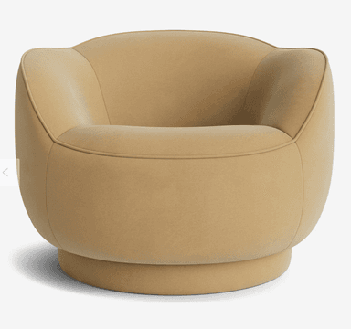 A modern, upholstered armchair with a rounded silhouette and a swivel base. The chair features a low, enveloping backrest that curves into the armrests, creating a continuous, soft form. The seat is also rounded and plush. The entire piece is covered in a textured fabric and rests on a cylindrical, self-finished base that allows for rotation. — 3D model