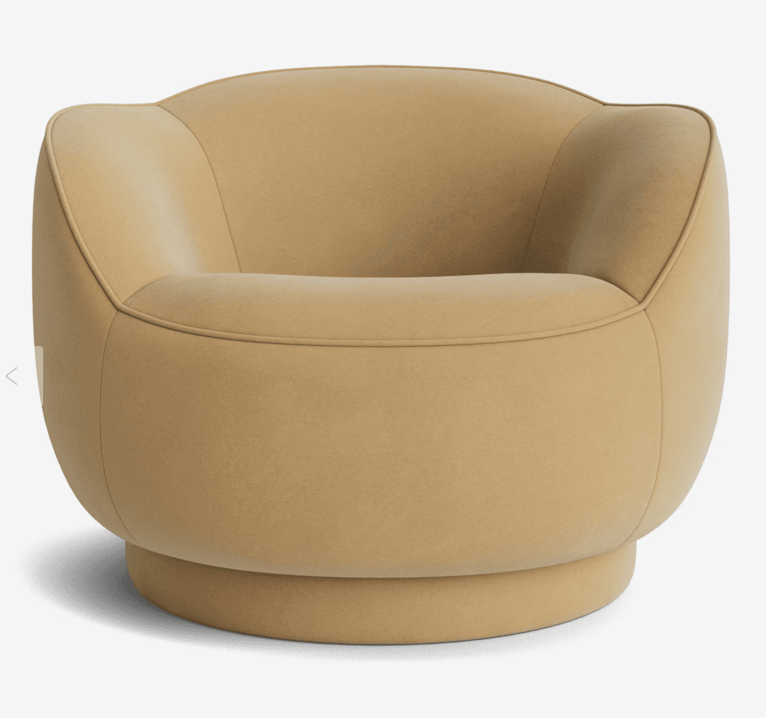 A modern, upholstered armchair with a rounded silhouette and a swivel base. The chair features a low, enveloping backrest that curves into the armrests, creating a continuous, soft form. The seat is also rounded and plush. The entire piece is covered in a textured fabric and rests on a cylindrical, self-finished base that allows for rotation. — 3D model