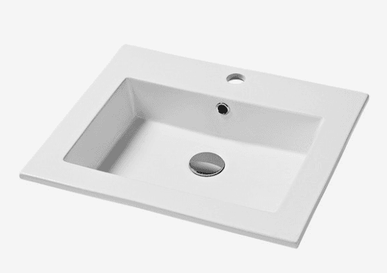 A rectangular white ceramic sink with a flat rim and an integrated basin. It features a central drain opening with a chrome stopper and an overflow hole positioned towards the rear of the basin. The sink is designed for installation on a countertop or vanity. — 3D model