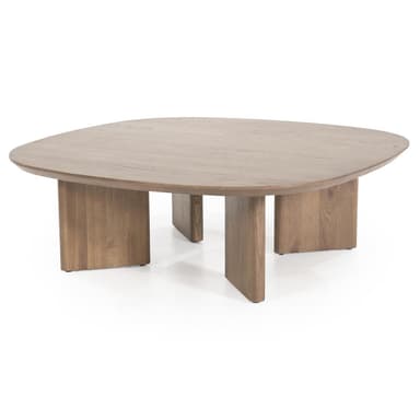 A contemporary coffee table with a rounded, organic-shaped tabletop and thick, block-like legs. The design exhibits a minimalist aesthetic with a focus on material and form. — 3D model