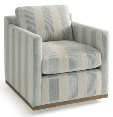 A striped armchair with thick upholstery and a squared-off design. It features a plush seat cushion and a separate back cushion. The base is a low-profile wooden plinth in a natural wood tone. The fabric has a textured weave with vertical stripes in a light blue and off-white color combination. — 3D model