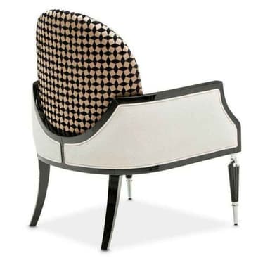 An upholstered armchair featuring a distinctive Art Deco or Hollywood Regency style. It has a curved, semicircular backrest covered in a black and cream geometric patterned fabric, contrasting with the main body upholstered in a textured cream fabric. The chair's frame, including the arms and front legs, is crafted from wood with a high-gloss black lacquer finish. The front legs are tapered and adorned with polished chrome caps, while the rear legs are plain black lacquered wood. — 3D model