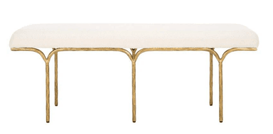 A long, upholstered bench with a rounded top and a slender, artistic metal base. The base features four legs that curve outwards from the underside of the seat, creating an open, sculptural form. The legs have a textured, organic appearance. — 3D model
