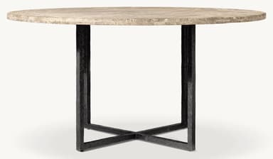 A close-up view of a round tabletop made of natural stone with a prominent veined pattern. The edge of the tabletop is visible, showing its thickness and textured surface. A dark-colored, likely metal, support structure is partially visible beneath the tabletop. — 3D model