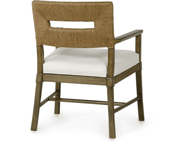 A wooden armchair with a woven back and a cushioned seat. The backrest features a horizontal rectangular opening and is constructed from a natural fiber rope, likely sisal or jute, woven in a textured pattern. The frame of the chair, including the legs, arms, and back supports, is made of wood with a distressed grey-brown finish. The seat is upholstered in a plain, off-white fabric cushion. — 3D model
