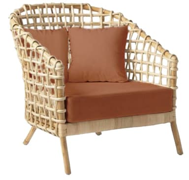 A contemporary lounge chair constructed from natural woven rattan, featuring an open, grid-like pattern on its curved back and armrests. It is furnished with a thick, flat seat cushion and two smaller back cushions, all upholstered in a solid terracotta-colored fabric. The chair rests on four slightly splayed, cylindrical rattan legs. — 3D model