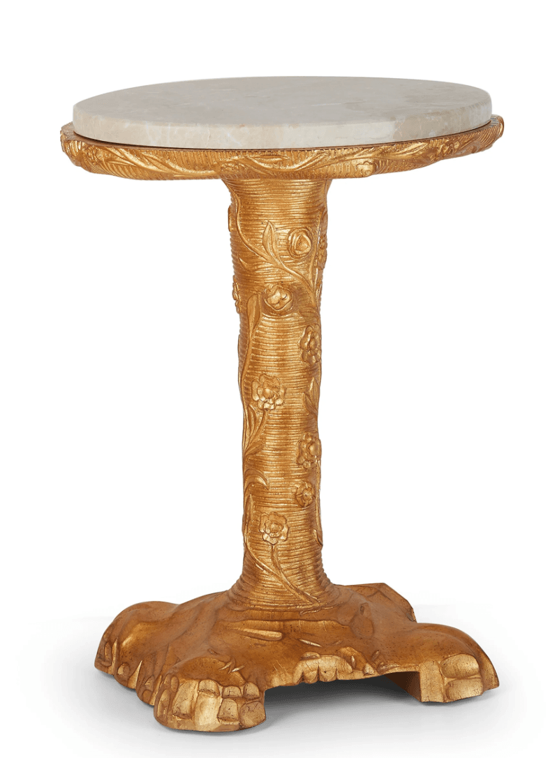 A small, round accent table featuring a circular white marble top and a highly decorative, intricately carved gilded base. The central pedestal and three-lobed base are adorned with floral and leaf motifs, finished in a shimmering gold. — 3D model
