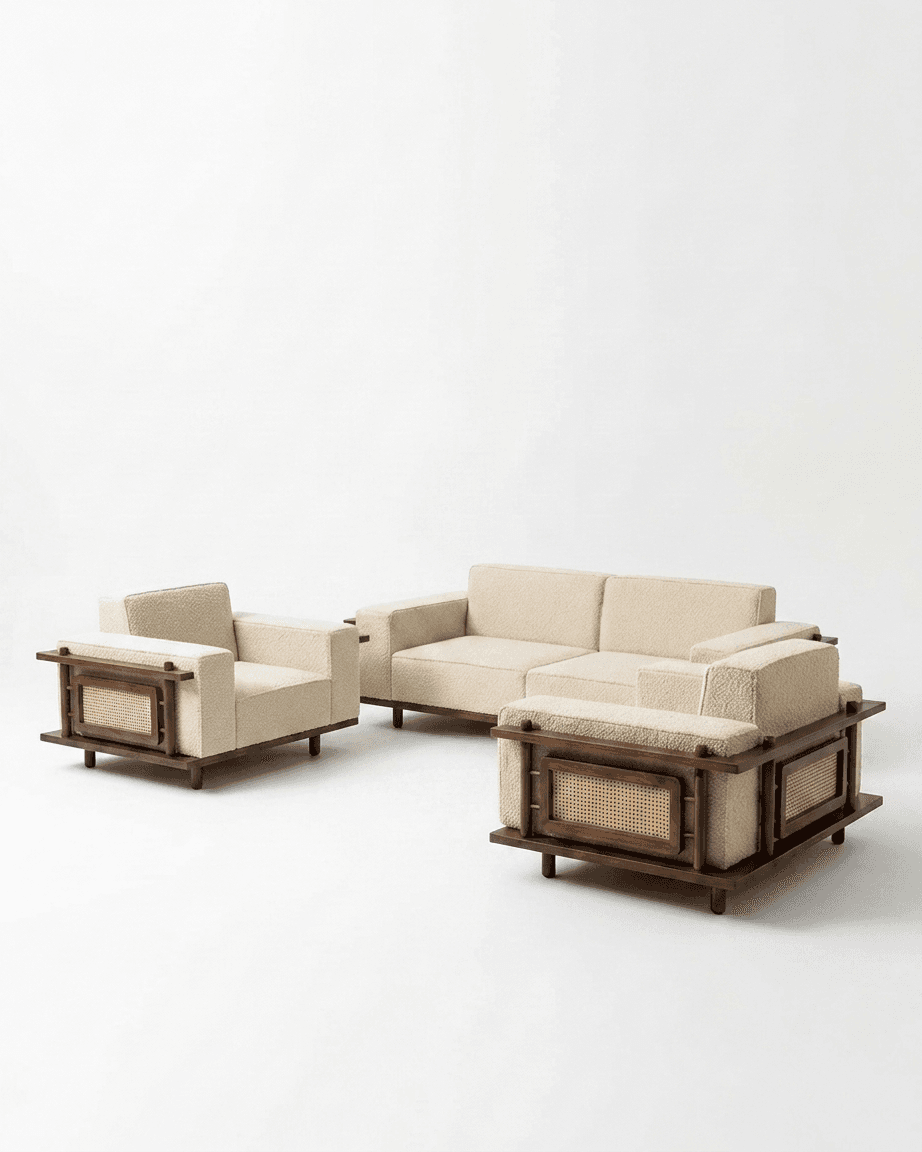 A matching set of living room furniture, including a two-seater sofa and two armchairs, featuring cream boucle upholstery, dark wood frames with exposed joinery, and woven cane panels on the outer sides. — 3D model