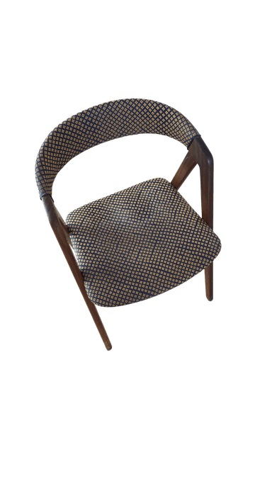 A wooden chair with upholstered seat and backrest. The upholstery features a repeating pattern of small, diamond-shaped motifs in a contrasting color. The frame appears to be made of wood with a dark finish. The chair has a simple, functional design. — 3D model