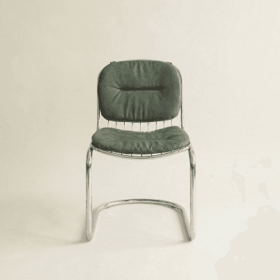 A modernist side chair featuring a polished chrome cantilever frame and separate, dark green upholstered seat and back cushions. The cushions have a subtle horizontal seam across their centers. — 3D model