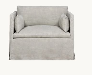 A light grey or off-white slipcovered sofa, viewed from the back, featuring a full skirted base with corner pleats and a separate back cushion. — 3D model