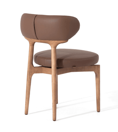 A contemporary chair with a wooden frame and upholstered seat and backrest. The frame has a natural wood finish with visible grain. The seat and backrest are upholstered in brown leather, featuring a smooth texture and rounded edges. — 3D model