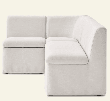 An L-shaped upholstered corner seating unit, consisting of multiple modules, featuring a light-colored fabric and clean, minimalist lines. — 3D model