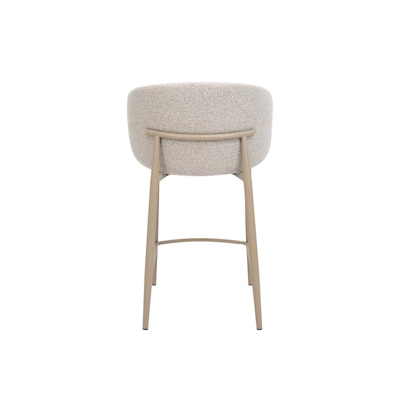 A modern bar stool with a rounded, upholstered seat and backrest. The frame consists of four slender, tapered legs connected by a subtle crossbar near the base and a curved element supporting the backrest. The upholstery features a textured, woven fabric. — 3D model