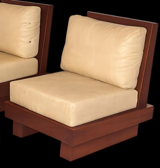 A modern armless lounge chair featuring a dark wooden frame and plush, light-colored upholstered cushions. The low-profile design includes a solid wooden backrest and a substantial wooden base with integrated block legs. The seat and back cushions are thick and appear to be made of a smooth material like faux leather, offering a comfortable seating experience. — 3D model