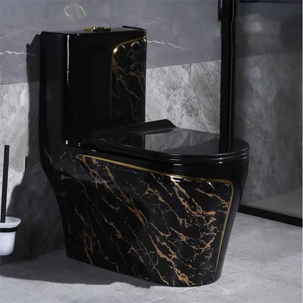 A modern, dual-flush toilet with a distinctive black marble-effect finish accented with gold veining. The toilet features a sleek, contemporary design with a concealed cistern within the tank and a soft-close seat. The flush button on top of the cistern is silver-toned. — 3D model
