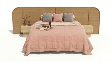 A modern platform bed featuring a light-toned wooden headboard with a distinctive curved side panel. The headboard integrates a matching wooden bedside table. The bed base is upholstered in a neutral fabric and is dressed with pink and grey bedding, including a quilted duvet and throw blanket. A wooden tray with wine and snacks rests on the bed. — 3D model