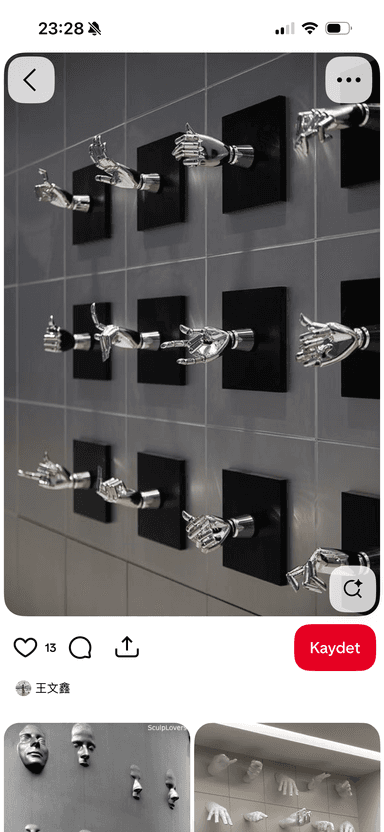 A collection of individual wall-mounted decorative objects, each depicting a chrome-plated robot hand making a distinct gesture. These bionic hands are affixed to square black backing plates and are arranged in a grid pattern on a tiled wall. Gestures include thumbs up, peace sign, pointing, and an open palm, all rendered with a metallic, polished finish that reflects light. — 3D model