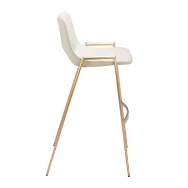 A contemporary bar stool featuring a subtly molded seat and backrest upholstered in an off-white or cream faux leather. The seat has a slight curvature for ergonomic comfort. It is supported by four slender, tapered metal legs in a gold or brass finish, connected by an integrated rectangular footrest for stability. The overall design is sleek and modern. — 3D model