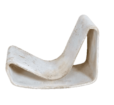 A sculptural lounge chair, likely made from a single piece of molded fiberglass or a similar composite material. It features a continuous, curved form that provides both the seat and backrest. The material is light-colored, possibly off-white, and shows significant signs of wear, discoloration, and potential staining, suggesting age or prolonged outdoor exposure. The design is minimalist and organic. — 3D model