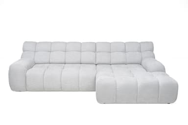 The image shows the back view of a contemporary sectional sofa module. It is upholstered in a light gray, subtly textured fabric. The backrest features horizontally segmented panels along the top, suggesting individual plush cushions or a channeled design. A clear vertical seam down the center indicates it is either a two-seater back or two joined modules. The base is low-profile with small, dark feet. — 3D model