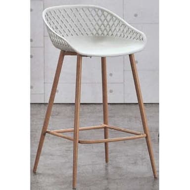 A modern bar stool featuring a white molded plastic seat with a lattice backrest, supported by four tapered wooden legs with an integrated square footrest. — 3D model