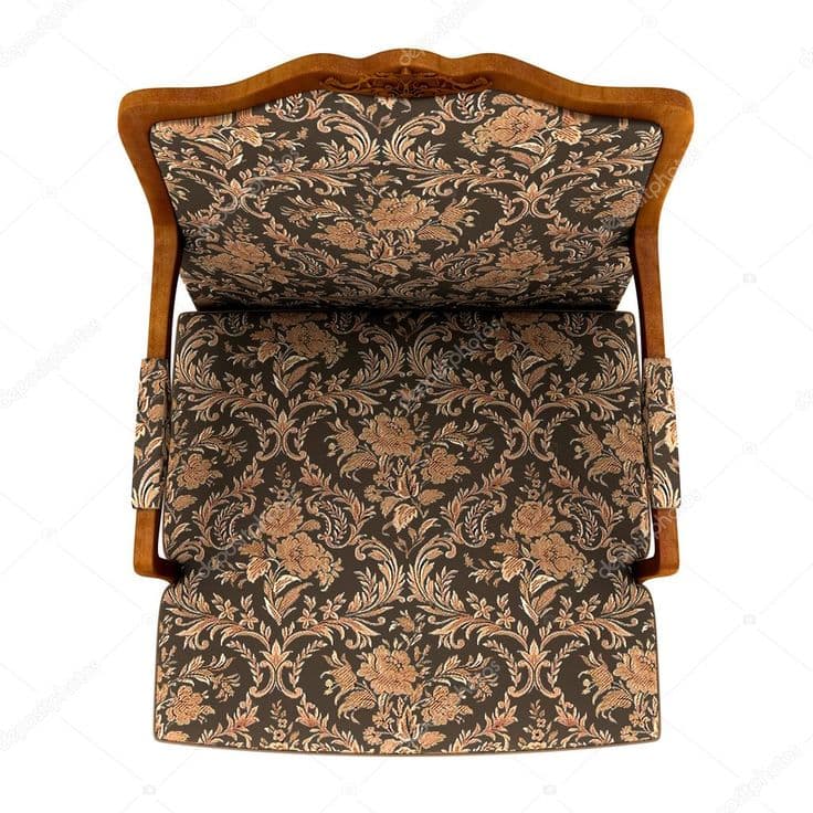 An armchair with a high, curved backrest and upholstered arms. The upholstery features a dense, ornate floral damask pattern. The wooden frame is visible along the edges of the backrest and arms, with carved detailing on the top of the backrest. — 3D model
