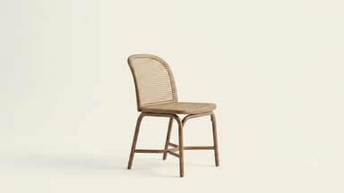 An armless dining chair featuring a gracefully curved frame that appears to be made of bentwood or a wood-effect material. Both the seat and the backrest are constructed from woven cane, providing a light, airy aesthetic. The chair has a uniform light brown or tan color, contributing to its natural and minimalist appeal. — 3D model