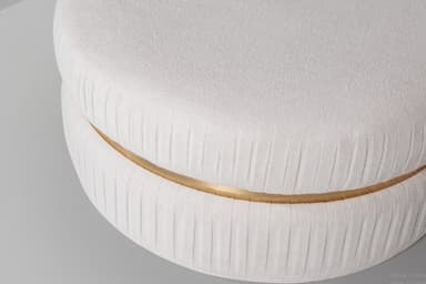 A round, upholstered ottoman with a textured fabric covering and a decorative metallic band around its midsection. The ottoman is composed of two stacked, cylindrical sections, both featuring vertical pleating in the upholstery. — 3D model
