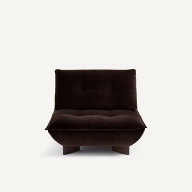A low-profile, tufted sofa with a deep seat and a single, adjustable backrest. The sofa features a rounded front edge and is supported by dark, rectangular wooden legs. The upholstery appears to be a plush velvet fabric. — 3D model