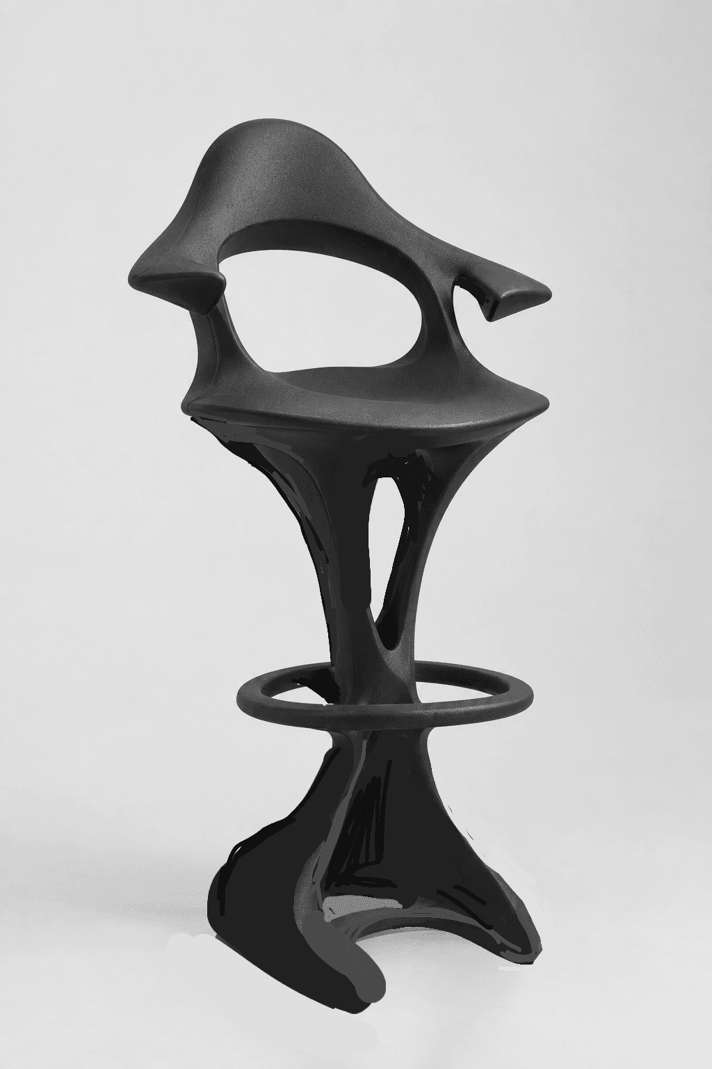 A striking, matte black bar stool characterized by its highly sculptural and biomorphic form. The design features a continuous, fluid shape encompassing the seat, backrest, and central pedestal base, which widens to a stable footprint. A circular footrest is integrated into the stem. — 3D model