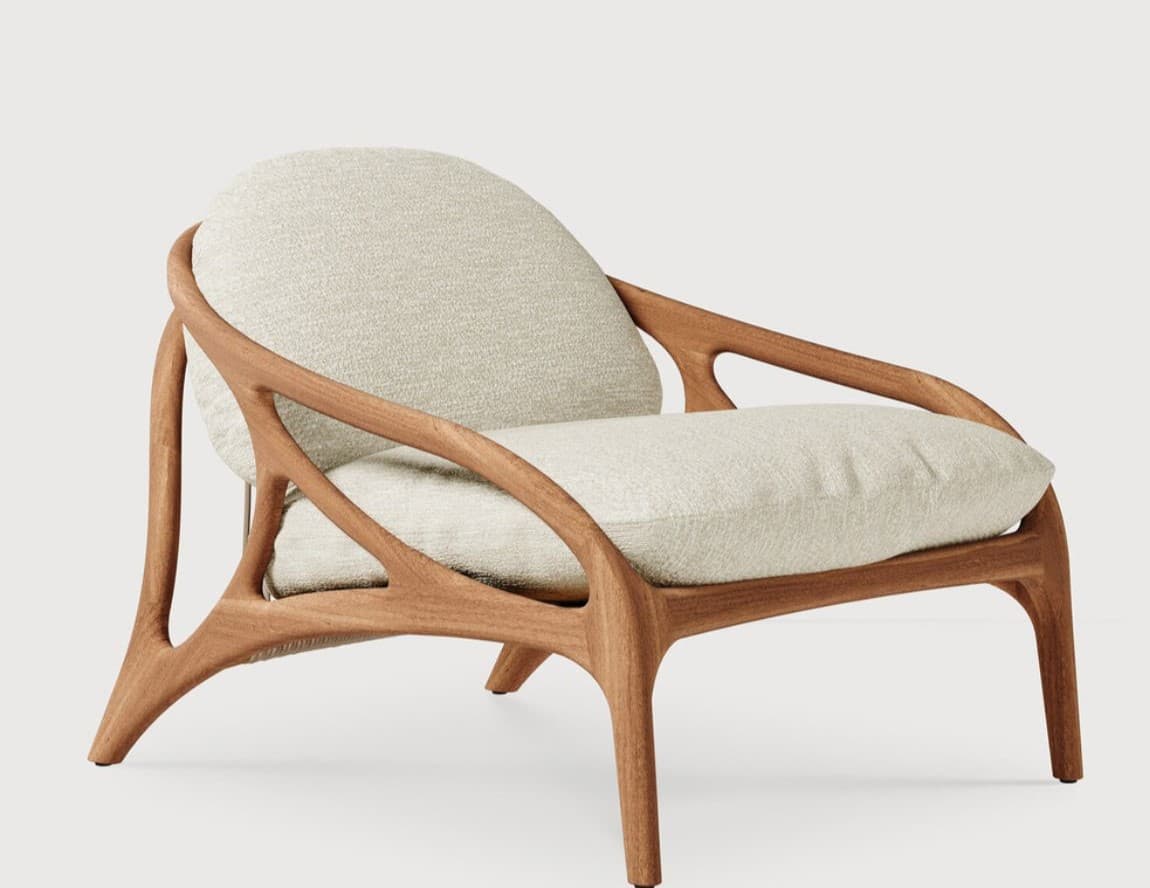A modern armchair with a distinctive organic-inspired wooden frame. The frame features curved, flowing lines that create an open, sculptural base and armrests. The seat and back are upholstered with a textured, light-colored fabric, providing a soft contrast to the solid wood structure. — 3D model