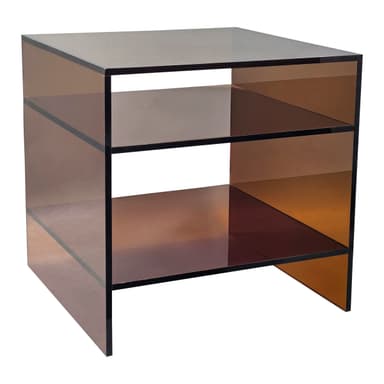A square, cube-shaped open shelving unit constructed from translucent acrylic. It features a three-tier design with a visually striking ombre color gradient that transitions from a vibrant amber or yellow-orange at the top and edges to a deeper reddish-brown or burgundy towards the bottom and center, creating a dynamic visual effect. The top surface appears as a darker, smoky tone. The minimalist form factor allows for versatile display and storage. — 3D model
