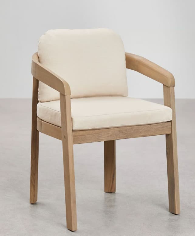 A contemporary armchair featuring a light-toned wooden frame and cream-colored upholstered cushions. The chair has a sturdy, block-like construction with straight, slightly tapered legs. The armrests are smoothly curved, extending from the backrest and connecting seamlessly to the front legs. Both the seat and back are fitted with thick, removable cushions, providing a comfortable seating experience. The design is clean and minimalist, highlighting the natural wood grain. — 3D model