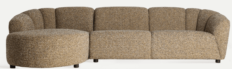 A modern modular sectional sofa upholstered in a variegated textured fabric, featuring a rounded chaise lounge component and channel-tufted backrests. The sofa consists of multiple sections, suggesting flexibility in configuration. — 3D model