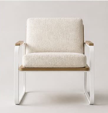 A modern armchair featuring a tubular metal frame in white, supporting a seat and back cushion upholstered in a textured, off-white fabric. The armrests are capped with light-colored wood, and the base incorporates curved wooden elements. — 3D model