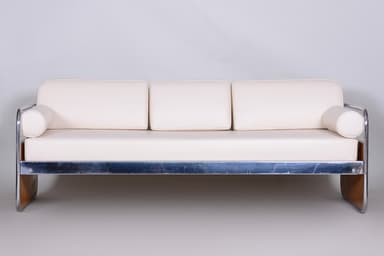 A three-seater sofa characterized by its tubular chrome frame, light wood end panels, and white upholstered cushions. The sofa features a minimalist design with a visible metal frame that extends to form the legs and back support. It includes three separate seat cushions, three back cushions, and two cylindrical bolster armrests at each end. The wood panels are integrated into the frame at the side ends. — 3D model