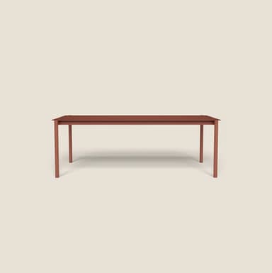 A minimalist, rectangular table with a solid, matte red-brown finish. It features a flat tabletop supported by four straight, slender legs positioned at each corner. The design is clean and contemporary, suggesting versatility for various settings. — 3D model