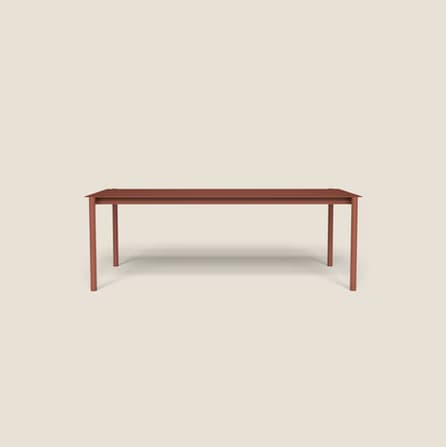 A minimalist, rectangular table with a solid, matte red-brown finish. It features a flat tabletop supported by four straight, slender legs positioned at each corner. The design is clean and contemporary, suggesting versatility for various settings. — 3D model