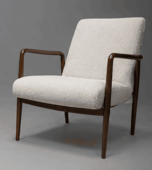 An upholstered lounge chair featuring a dark stained wooden frame and cream-colored boucle fabric. It has open, rounded armrests and tapered legs, embodying a Mid-Century Modern aesthetic. — 3D model
