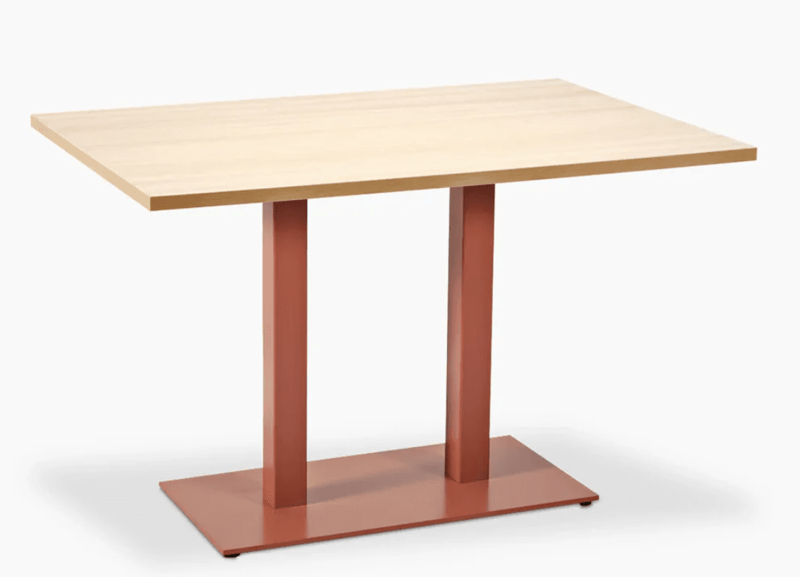 A rectangular dining table with a light wood veneer top and a pedestal base. The base consists of two vertical rectangular columns supported by a flat rectangular plinth. The columns and plinth are finished in a matte reddish-brown color. — 3D model