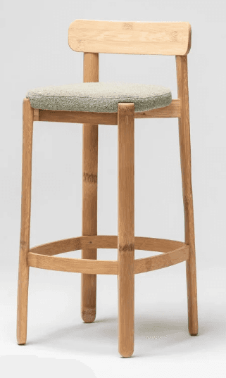 A natural bamboo bar stool featuring a light green upholstered seat and a simple, integrated backrest. The stool has four legs reinforced by a circular footrest rung. — 3D model