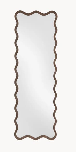 A full-length mirror with an irregular, wavy frame. The frame has a textured appearance, resembling wood or a similar organic material. The reflective surface is clear and undistorted. — 3D model
