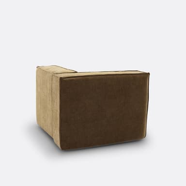 A low-profile, upholstered corner armchair with a modular design. It features a deep seat cushion and a wrap-around backrest forming a corner configuration. The upholstery has a distinct corduroy texture. — 3D model